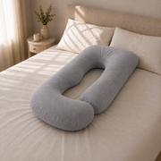 Almohada de embarazo ergonómica en U plata sobre la cama